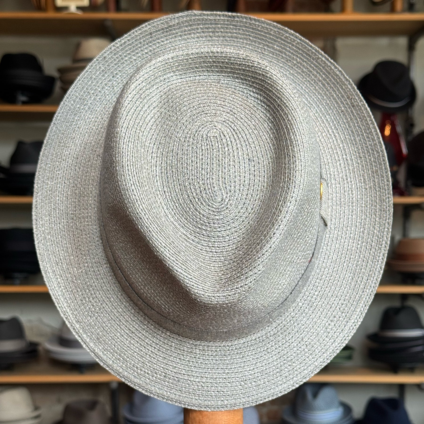 Light gray woven linen fedora hat with a smooth crown and wide brim, showcasing the Linen Maleo Fedora style perfect for stylish warm-weather wear.