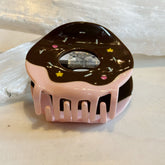 Donut Hair Clip designed with glossy chocolate and pink icing details and colorful star and sprinkle accents, stylishly shaped for a playful hair accessory.